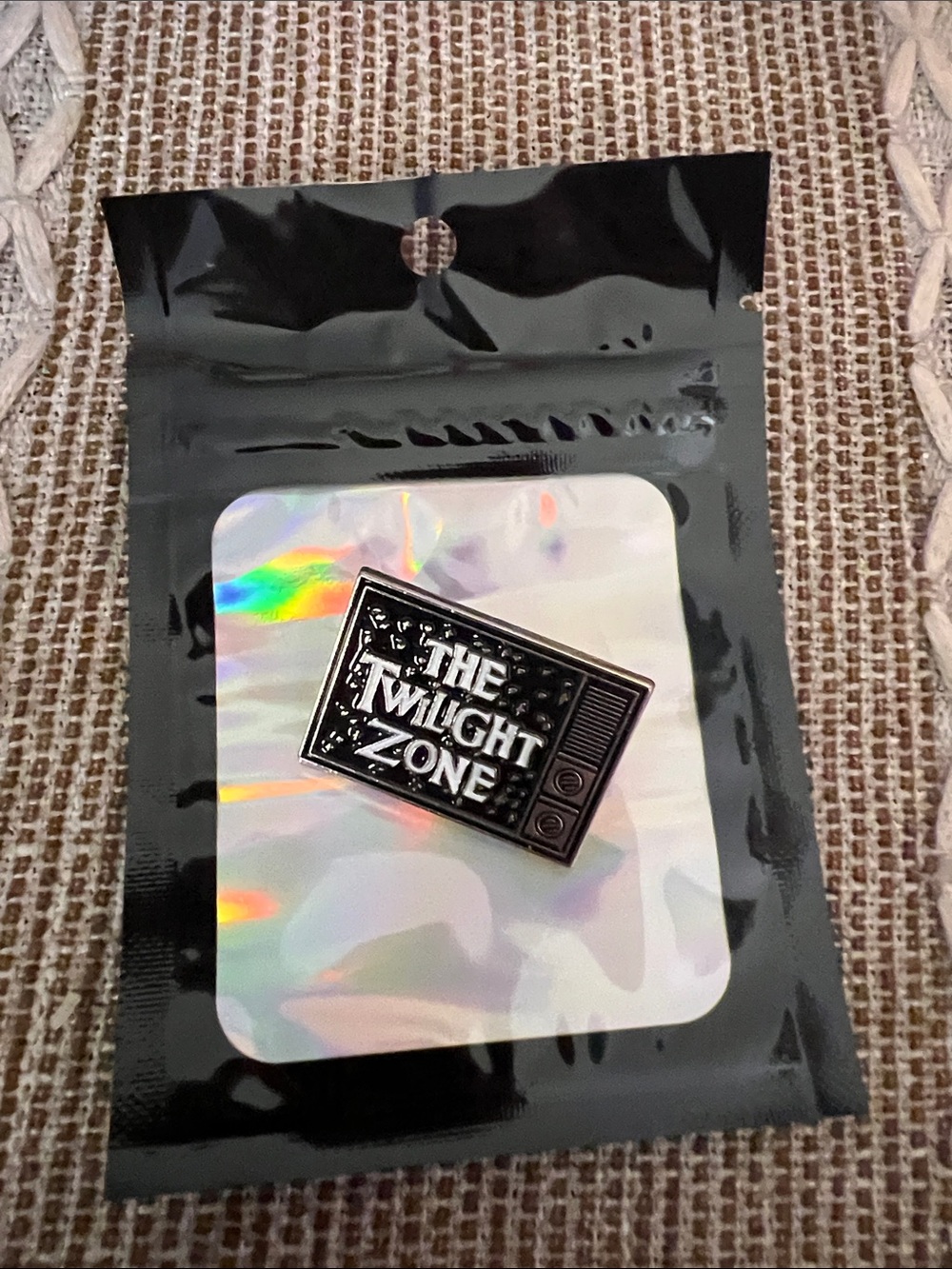 Twilight zone enamel pin
